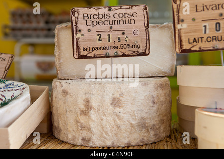 French cheeses on sale at food market at Sauveterre-de-Guyenne, Bordeaux, France Stock Photo