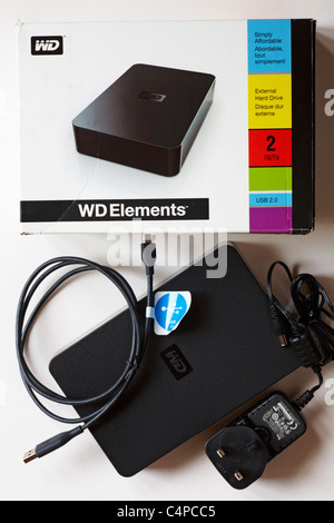 WD Elements external hard drive - box, hard drive and leads set on white background Stock Photo