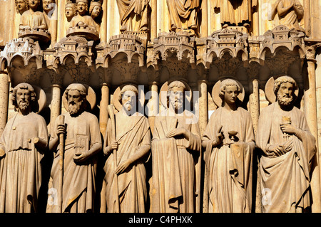 Details of the carvings above the doors of Notre Dame Cathedral in Paris Stock Photo