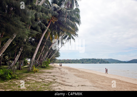 Sandy Beach with bathers on Koh Chang Island in Southeast Thailand;Asia Stock Photo