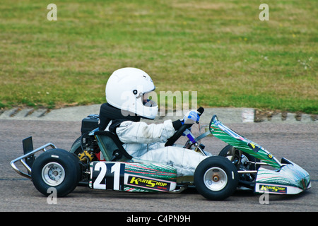 A single go-kart doing the circuit View from the side. Close up Stock Photo