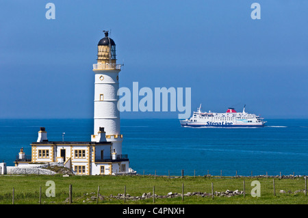 Corsewall Lighthouse Hotel at Corsewall Point near Stranraer in Scotland with Stena Line car ferry passing en route to Belfast Stock Photo