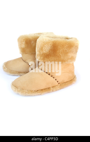 Warm winter home shoes isolated on white background. Stock Photo
