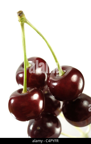 Three cherries close-up Isolated on white background Stock Photo