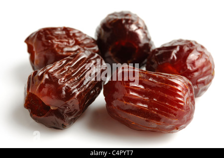 Dried dates close-up Isolated on white background Stock Photo
