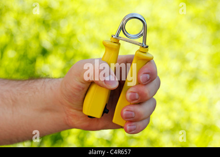 Hand grip tool for exercise. Stock Photo