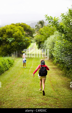 Two women on on Nounou Mountain hiking trail, Kauai, Hawaii, USA