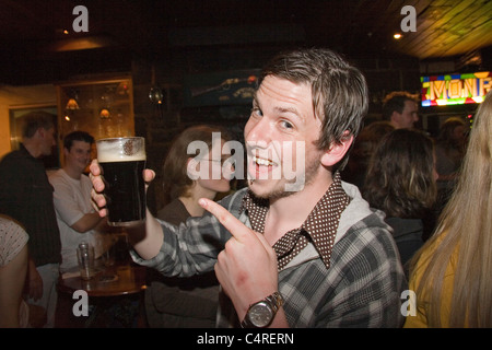 Socializing in a traditional Irish pub, Galway, County Galway, Ireland Stock Photo