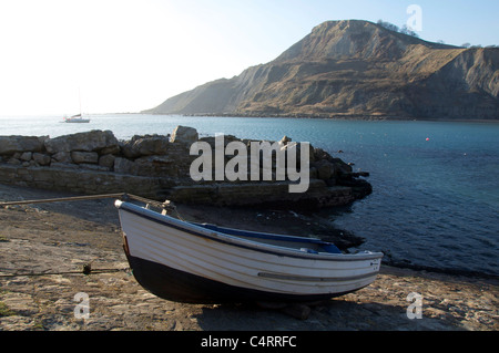 A rowing boat on the slipway at Chapman’s Pool. A remote cove sheltered by towering cliffs on the Isle of Purbeck. Jurassic Coast, Dorset, England, UK Stock Photo