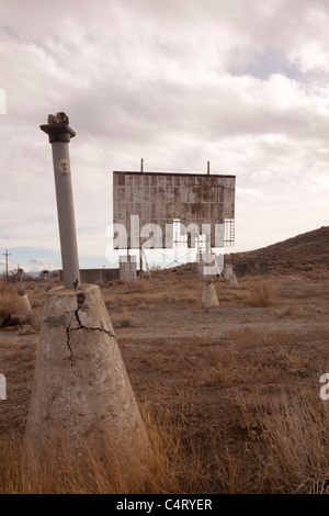 old abandoned drive-in movie theater on a cloudy day desert Stock Photo