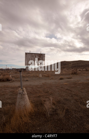 old abandoned drive-in movie theater on a cloudy day desert Stock Photo