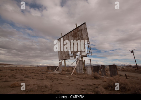 old abandoned drive-in movie theater on a cloudy day desert Stock Photo