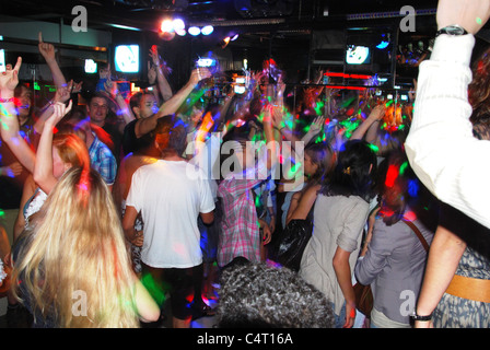 teenage boys and girls at a Spanish disco Stock Photo