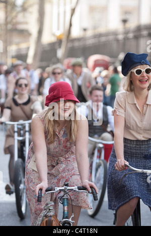 Well-dressed cyclists ride in the London Tweed Run, 2011 Stock Photo
