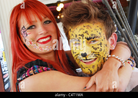 close up portrait of young Caucasian couple embracing Stock Photo