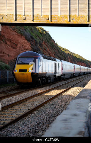 first great western high speed train heading for dawlish along the coastal railway line devon england uk Stock Photo