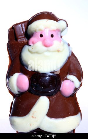 Chocolate Santa Claus figures, faces, portrait. Christmas time sweets. Stock Photo