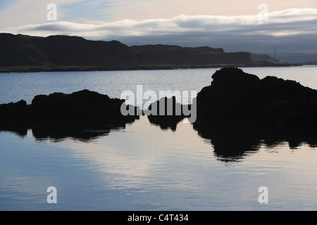 Looking across towards the Isle of Mull from Ellenabeich (often called Easdale) on the Isle of Seil. Stock Photo