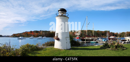 A Small Decorative Lighthouse And Boats In Harbor At Kennebunkport, Maine, USA, Panoramic View Stock Photo