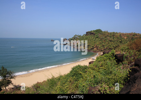 Sandy beach in South India seen from a high perspective with a clear view of the sea and surrounding area.