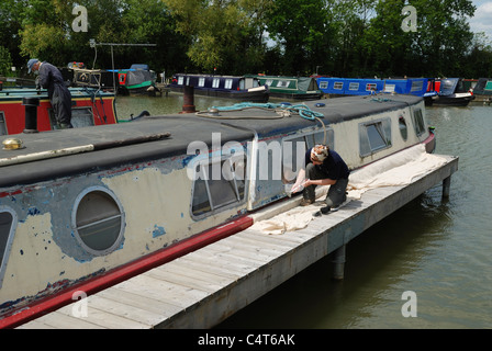 Traditional English narrow boats being restored at Gayton Marina, Northamptonshire, England. Stock Photo
