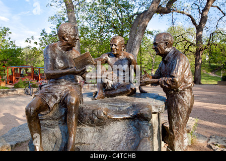 Philosopher's Rock Bronze Sculpture in Austin, Texas at Barton Springs Pool Stock Photo
