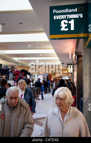 Pound shops in the Stratford Shopping Centre. This area has a few bargain shops as well as regular stores. Stock Photo