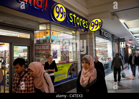 Pound shops in the Stratford Shopping Centre. This area has a few bargain shops as well as regular stores. Stock Photo