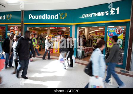 Pound shops in the Stratford Shopping Centre. This area has a few bargain shops as well as regular stores. Stock Photo