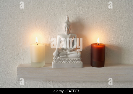 Buddha Statue and Candles Stock Photo