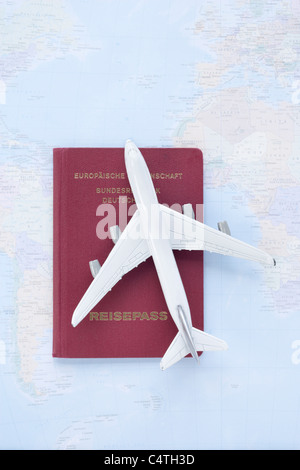 Toy Plane, Passport and Map Stock Photo