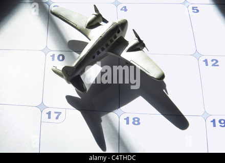 Toy Plane on Calendar Stock Photo