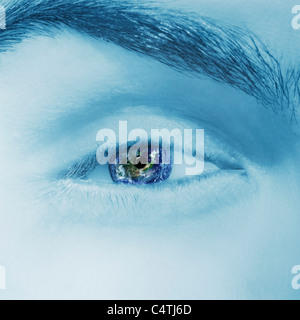 Blue scale close-up of man's eye with earth reflection Stock Photo