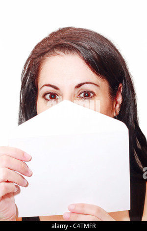 Beautiful woman covering her face with a letter isolated Stock Photo