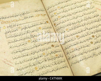 Closeup photo of The Quran written in 1464 Stock Photo