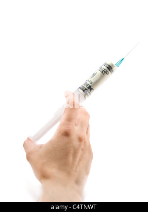 syringe is with a hypodermic needle in a hand, isolated on white Stock Photo