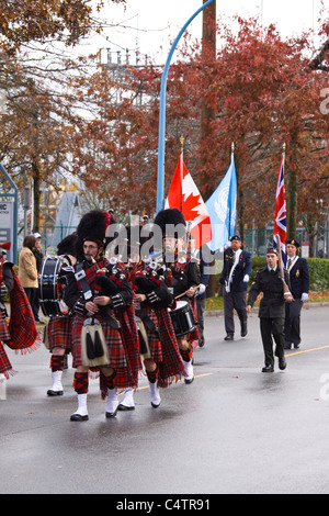 Pipe band in Remembrance Day Parade, Port Coquitlam, BC, Canada Stock Photo