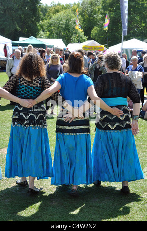 Belly dancers performing at Leamington Peace Festival Stock Photo