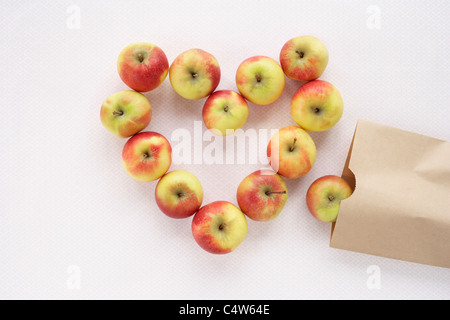 Apples in Heart Shape Stock Photo