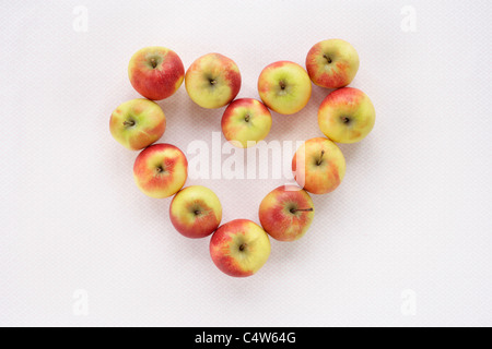 Apples in Heart Shape Stock Photo