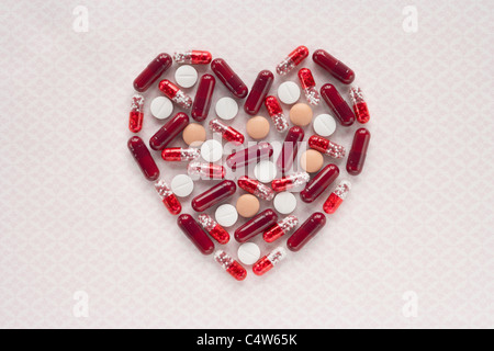 Pills in Heart Shape Stock Photo
