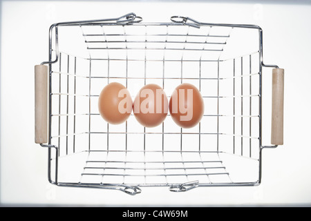 Eggs in Shopping Basket Stock Photo