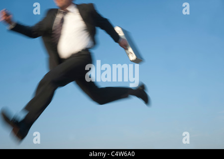 Businessman Jumping, Mannheim, Baden-Wurttemberg, Germany Stock Photo