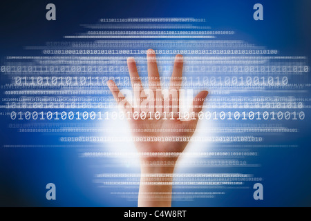 Digital image of hand and binary digits Stock Photo