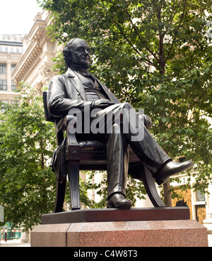 Statue of Sir George Peabody at the rear of the Royal Exchange, City of London, London Stock Photo