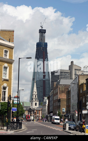 A view along Borough High Street in London, including The Shard of Glass building still under construction Stock Photo