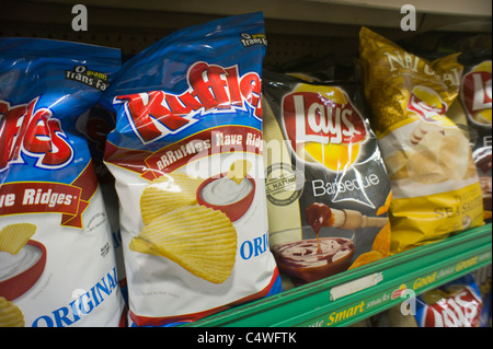 A display of potato chips are seen in a supermarket in New York Stock Photo