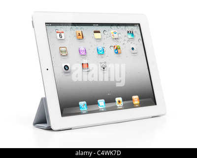 Apple iPad 2 tablet computer with smart cover folded as a stand. Isolated with clipping path on white background Stock Photo