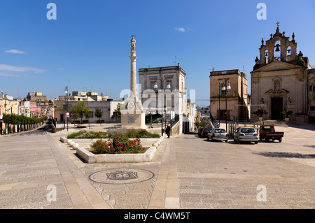 Italy - Montescaglioso, hill town near Matera, Basilicata, Italy. Town square and Mother Church. Stock Photo