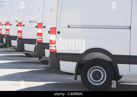 USA, Florida, Miami, White trucks parked side by side Stock Photo